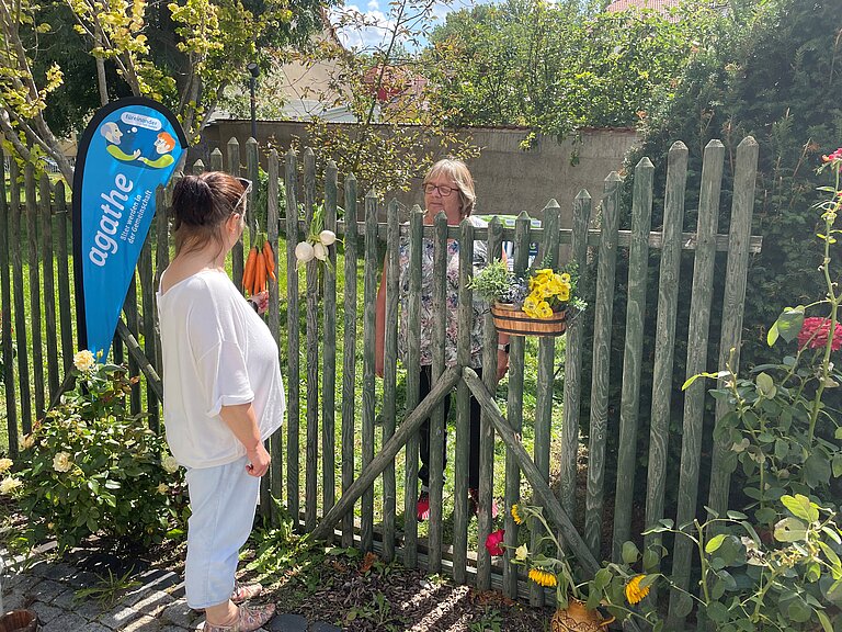 Gespräch über'n Gartenzaun