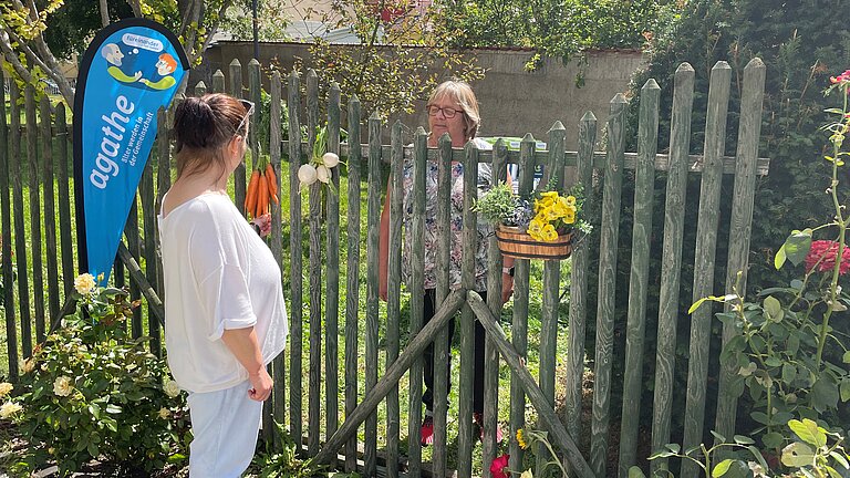 Gespräch über'n Gartenzaun